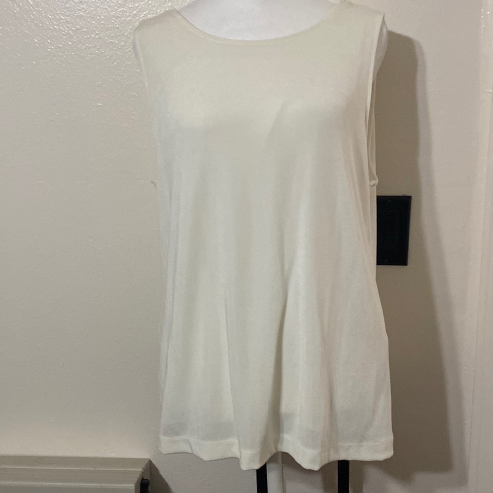 White tank top size 2 petite sheer lined by Chicos.